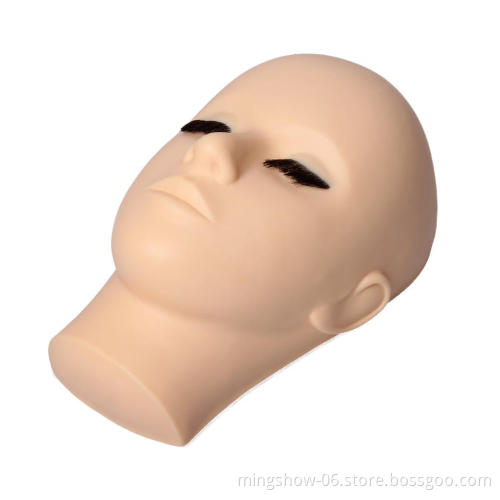 Hand-painted mannequin head with eyelashes training